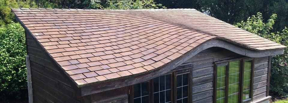 cedar shingle reroof, outbuilding reroof, curved roof, sloped roof, cornwall, cornish roofers, M.A.R. Roofing