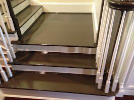 A close up of a set of stairs in a house.