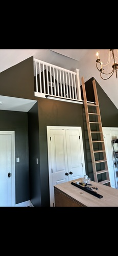 There is a ladder in the middle of the room.