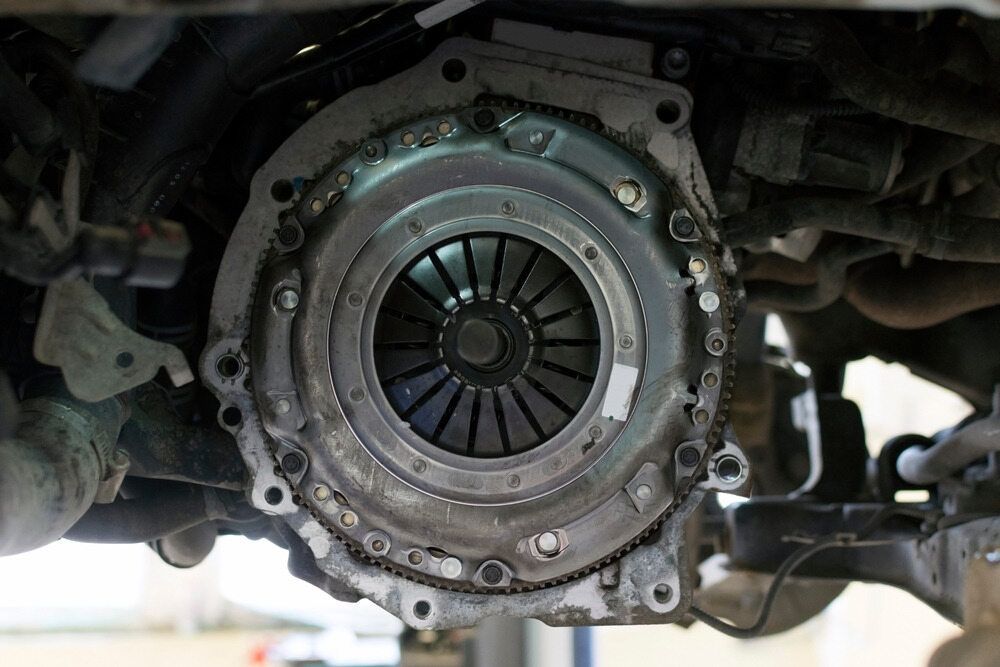 A Close Up of a Clutch on the Underside of a Car — Macquarie Brake & Automotive Services In Port Macquarie, NSW