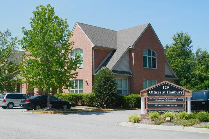 A large brick building with a sign that says office at ramsbury