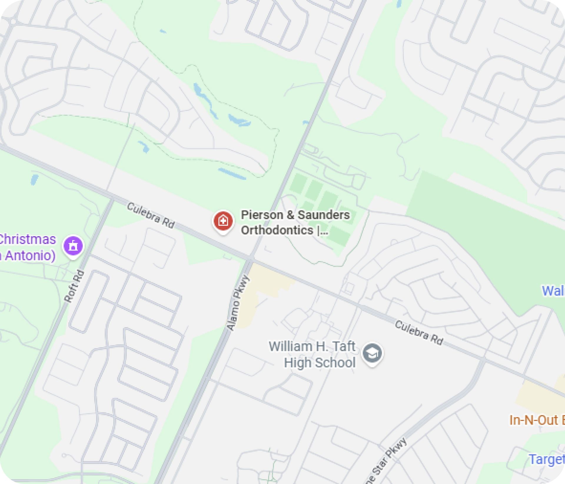 A map showing William H. Taft High School and Ellison A. Saunders Orthodontics at the intersection of Culebra Rd and Grissom Rd.