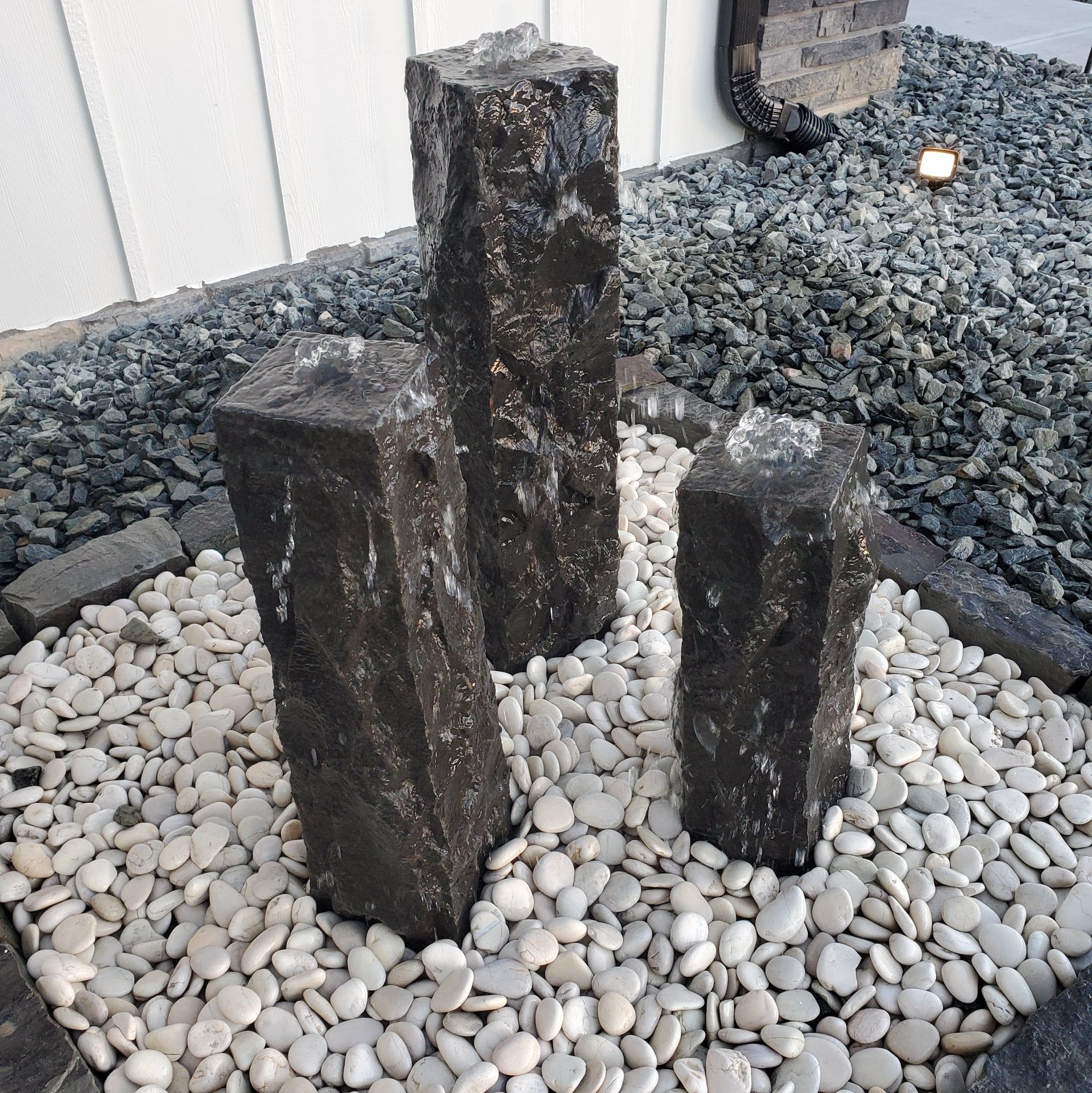 A group of rocks sitting on top of a pile of gravel