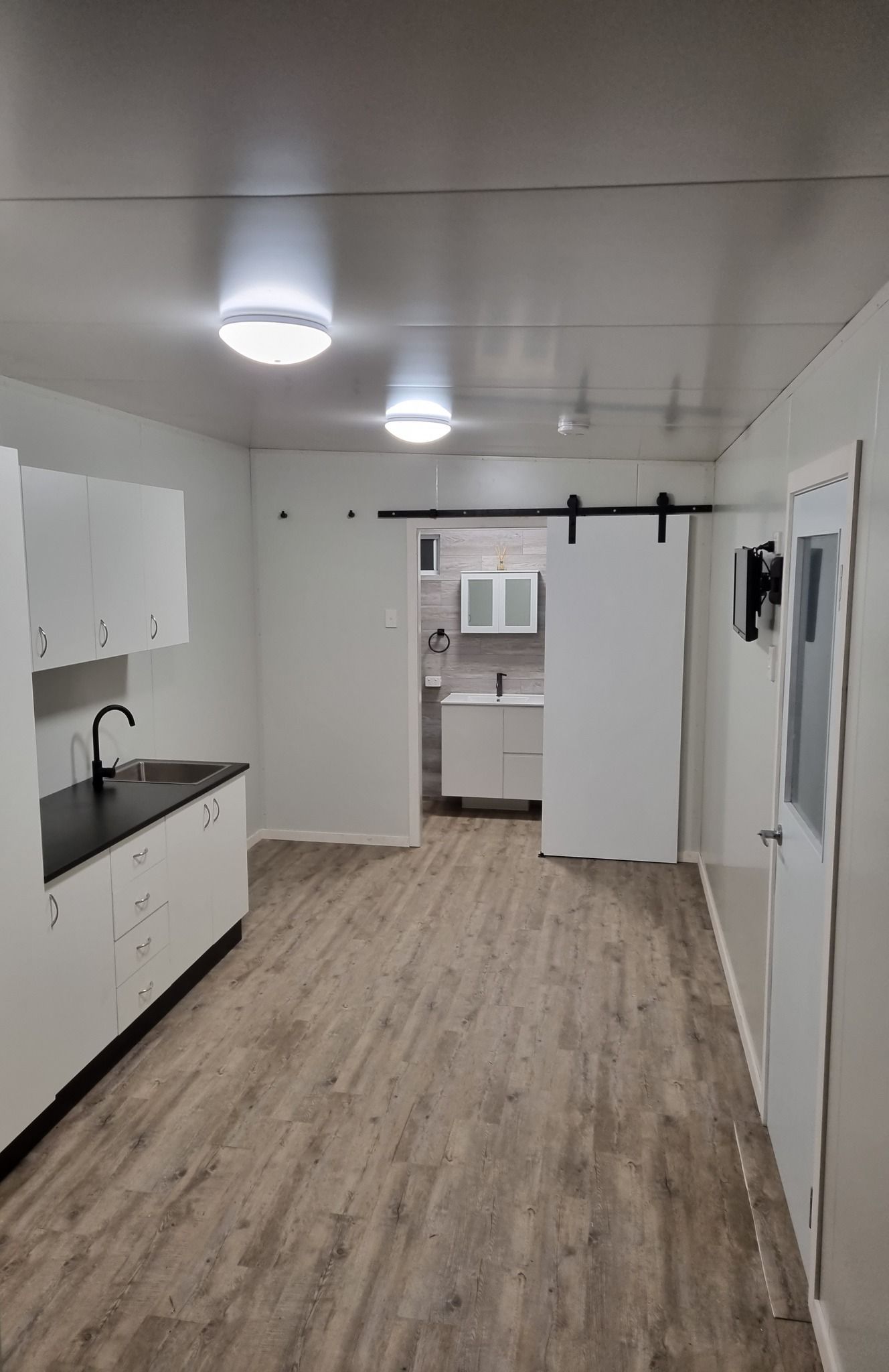 Deck Installations with Stairs and Chairs — Professional Tiny House Builders in Nanango, QLD