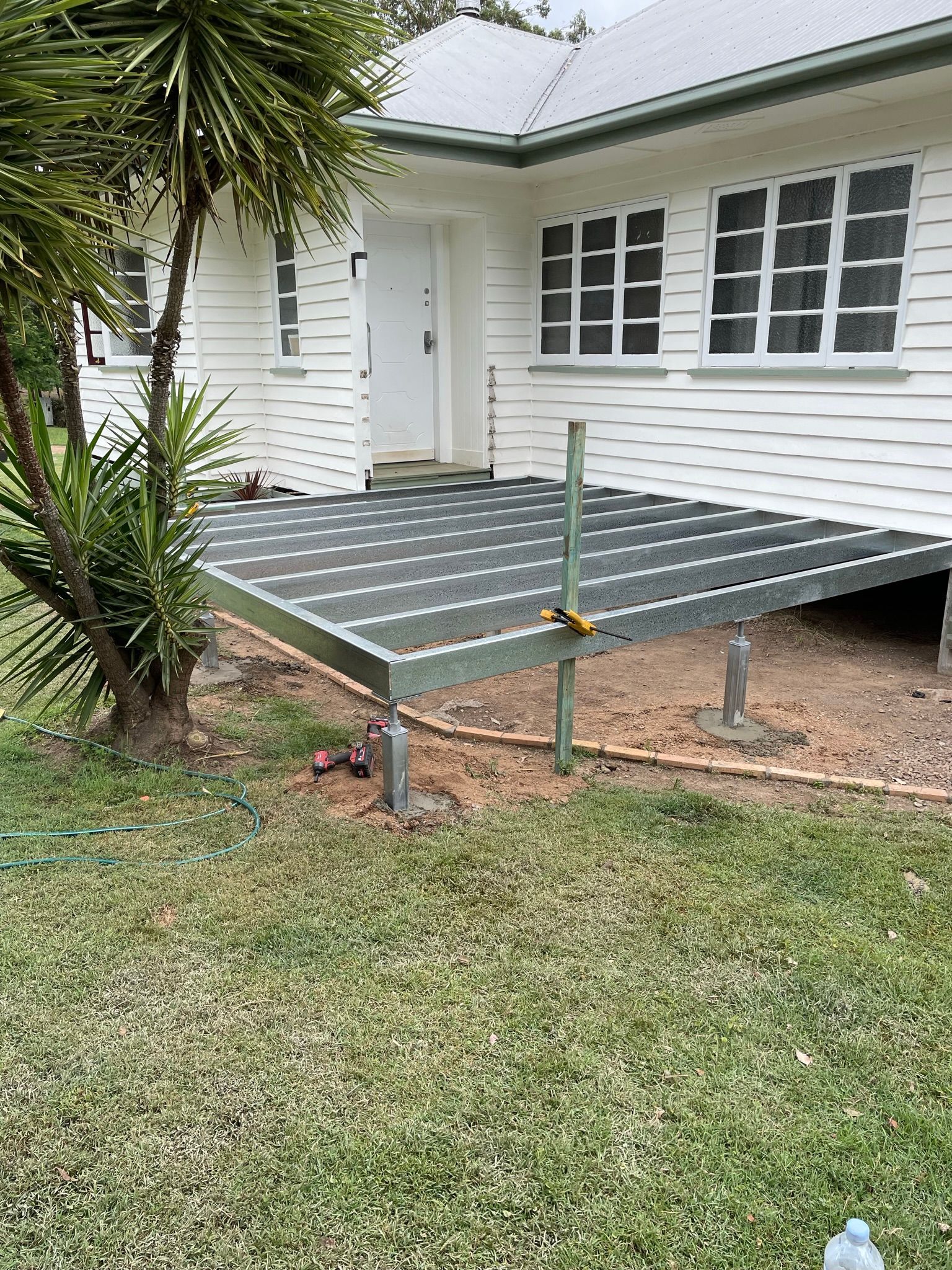 Bathroom Wall Tiling On Progress — Professional Tiny House Builders in Nanango, QLD