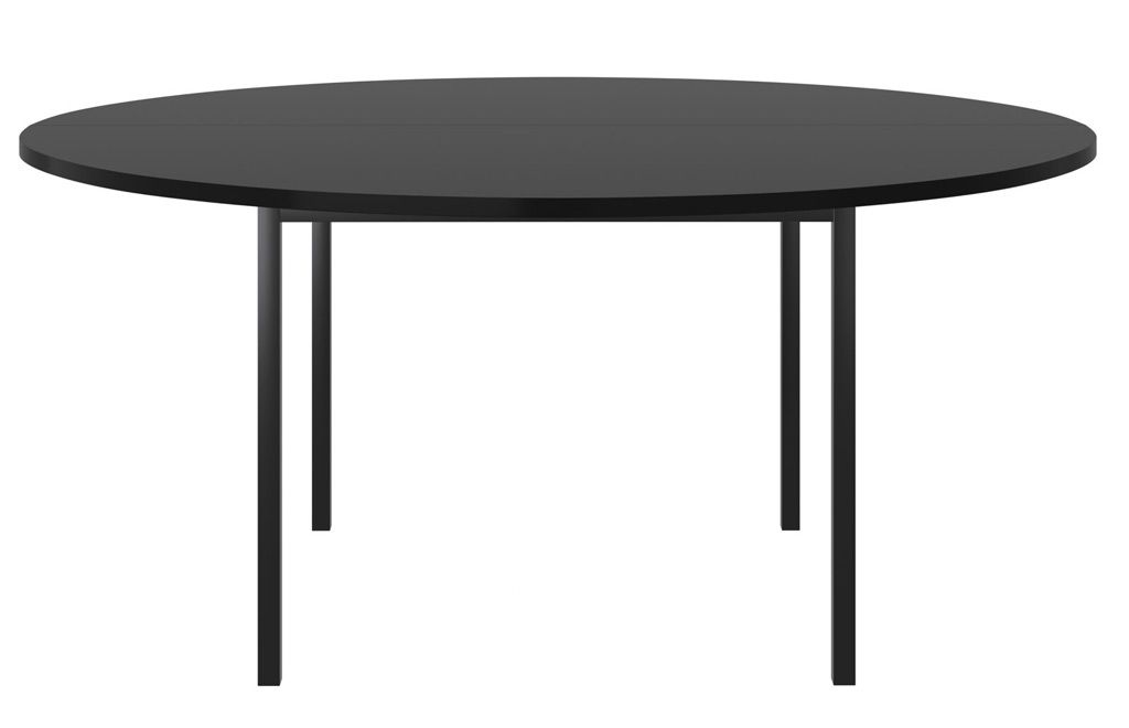 Svart rundt spisebord med fire ben.