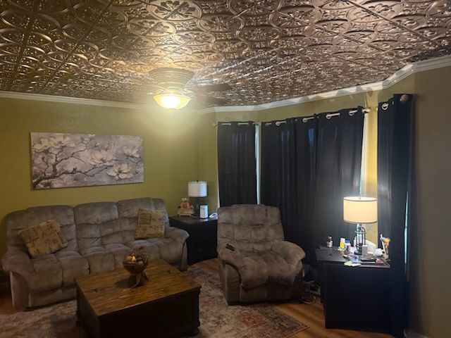 A split image showing a rustic unfinished attic space on the left and a renovated, modern room with wood floors on the right.