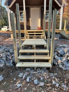 A collage shows construction work on a house exterior, including exposed wooden wall studs and damaged siding.