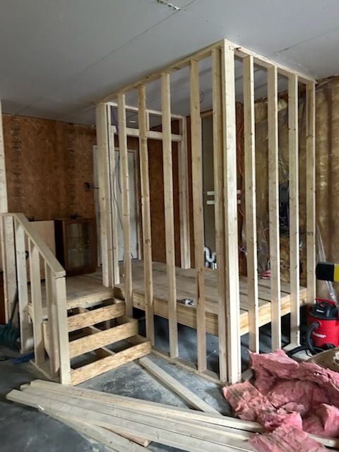 Collage showing home interior renovations: neutral and orange-painted rooms, a ceiling fan, and a doorway under construction.