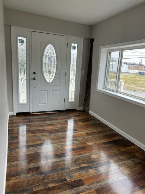 Collage showing home interior renovations: neutral and orange-painted rooms, a ceiling fan, and a doorway under construction.