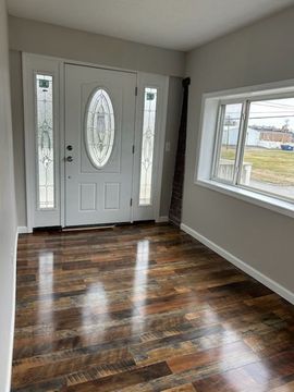 Collage showing home interior renovations: neutral and orange-painted rooms, a ceiling fan, and a doorway under construction.
