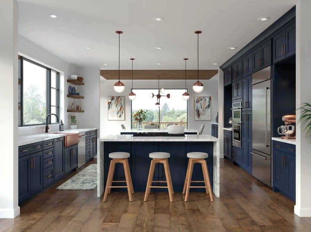 Granite countertops and two pendant lights above island