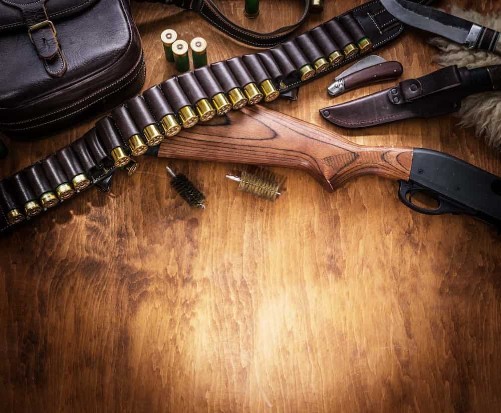 A Shotgun and Leather Ammunition Belt With Cartridges — Mackay Shooters Supplies in Longreach, QLD