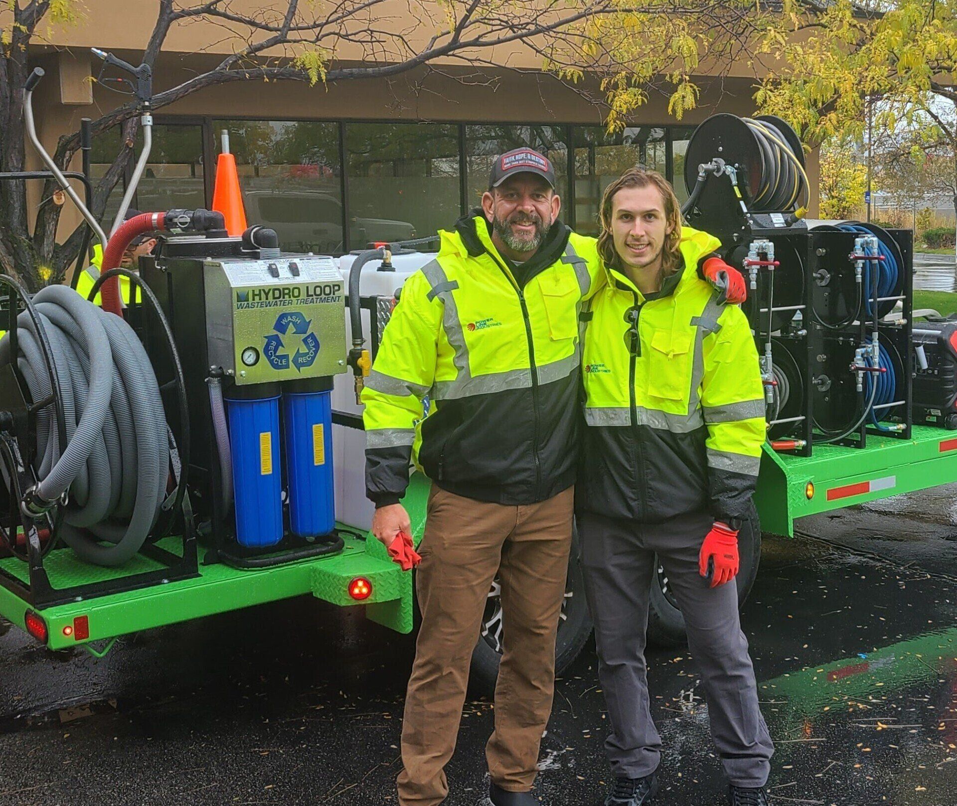 High-pressure hot water cleaning a concrete driveway, removing dirt and grime in Tigard Oregon