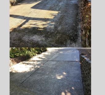 Hot water pressure washing removing mold from a home's exterior in Tigard Oregon