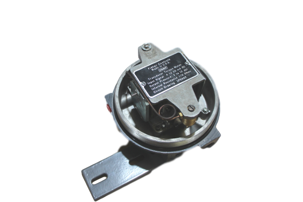 Small metal pressure switch with mounting bracket, shown on a white background