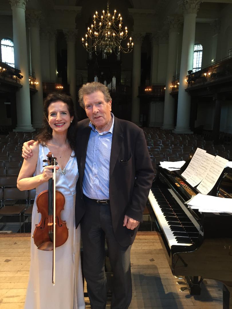 madeleine mitchell with flowers and blue overlay