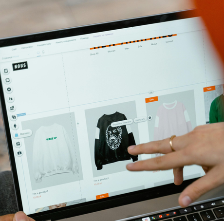 A laptop with a picture of a salad on the screen