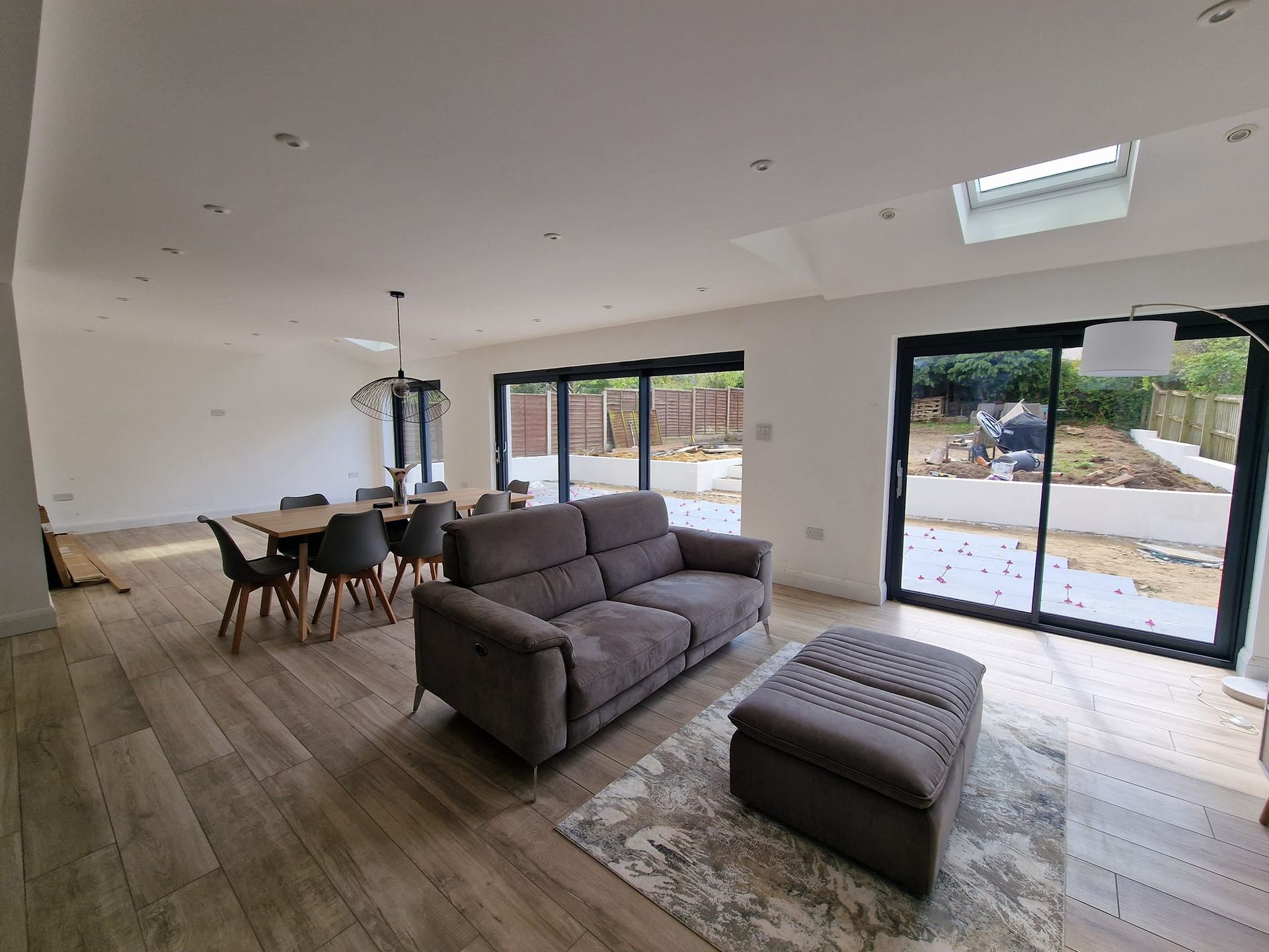 A large beautifully designed living area in a rear extension in Suffolk by Pro Build East Ltd.