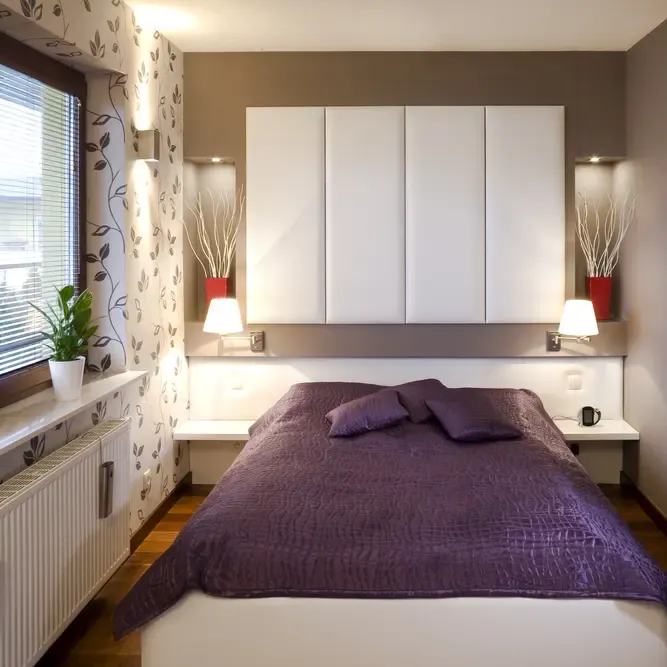 Garage conversion in Suffolk by Pro Build East Ltd transformed into a beautiful bedroom with modern design, natural lighting, and high-quality finishes