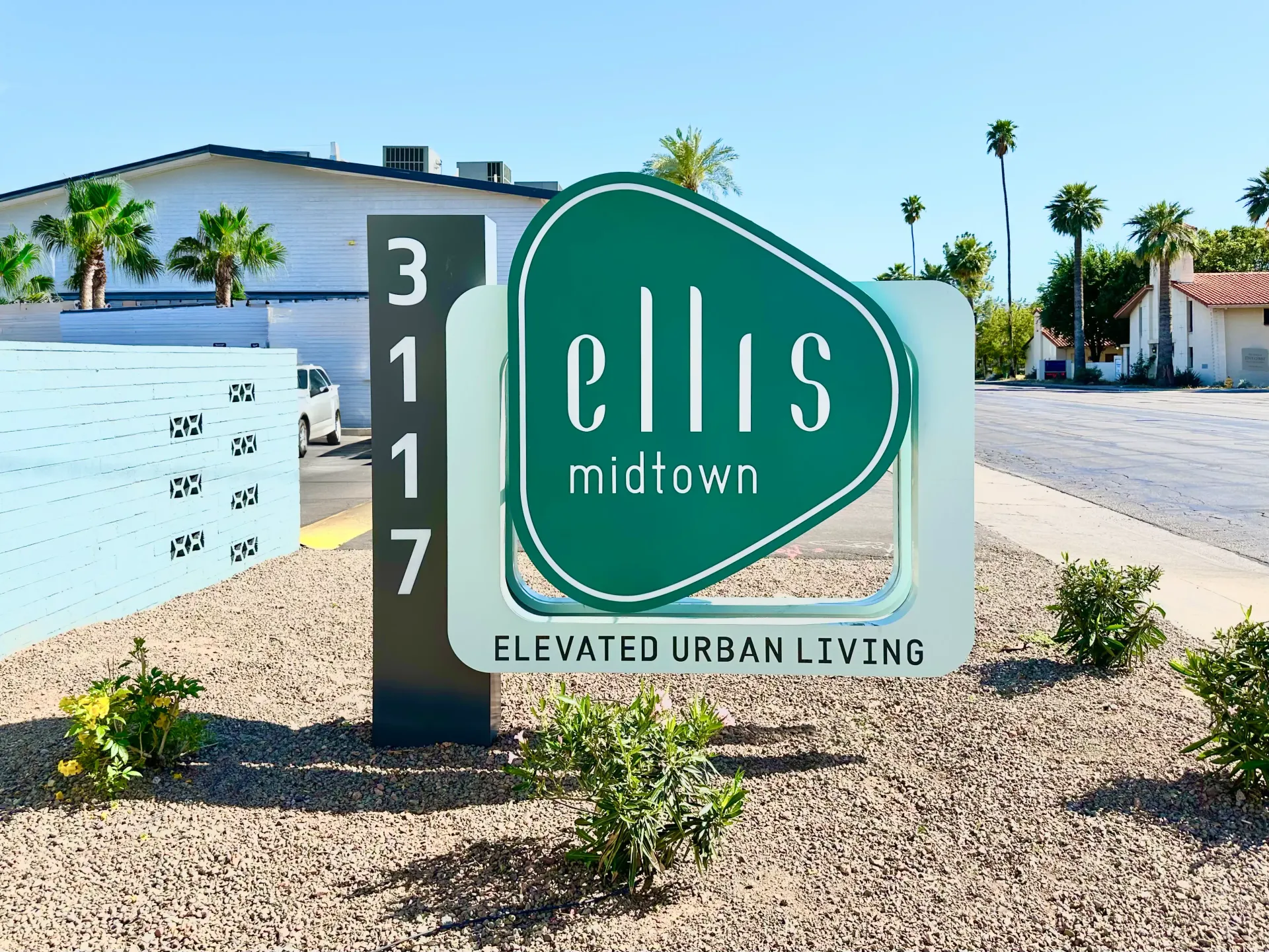 A sign that says ellis on it in front of a building