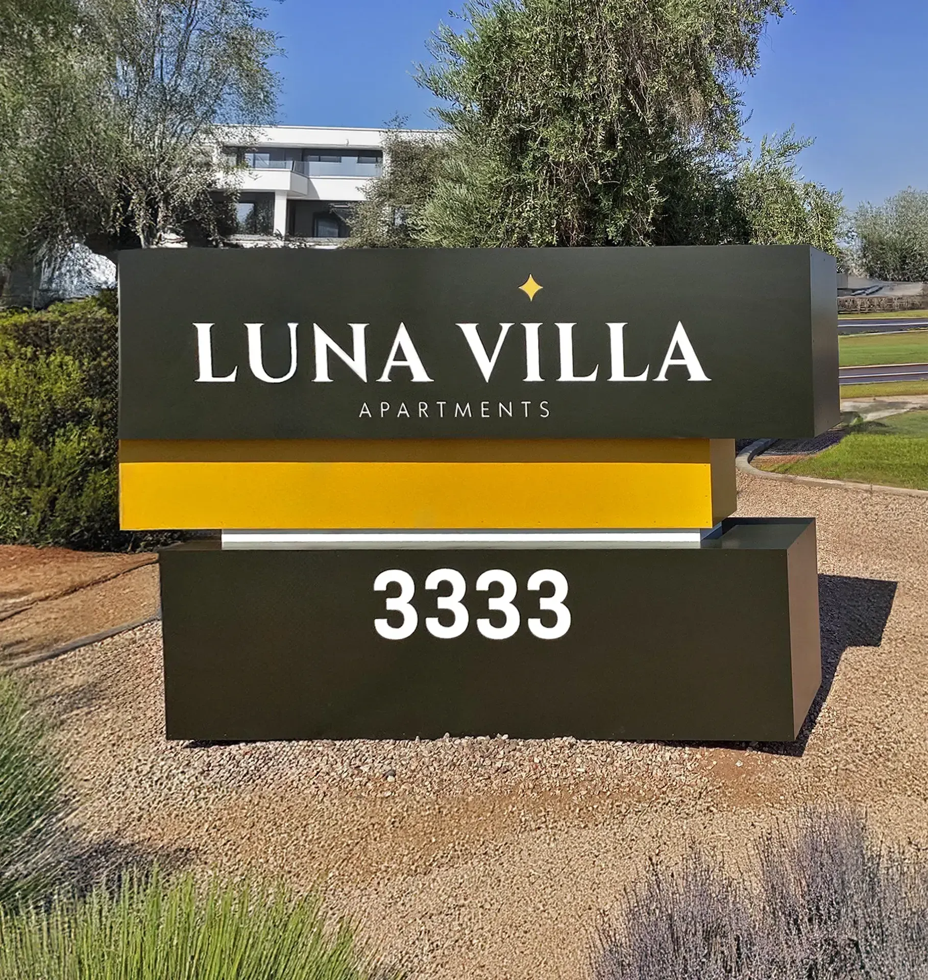 A black and yellow sign for luna villa 3333
