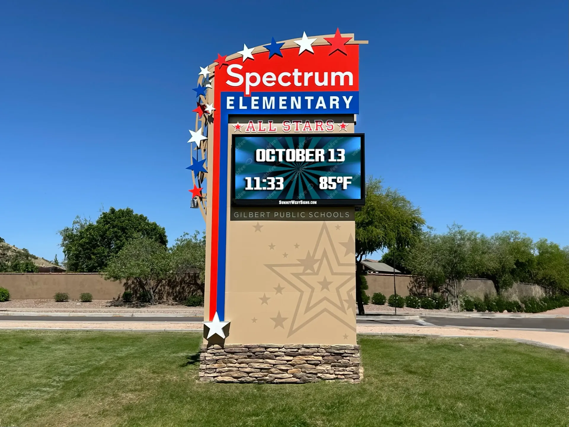 A sign for spectrum elementary shows the time and temperature