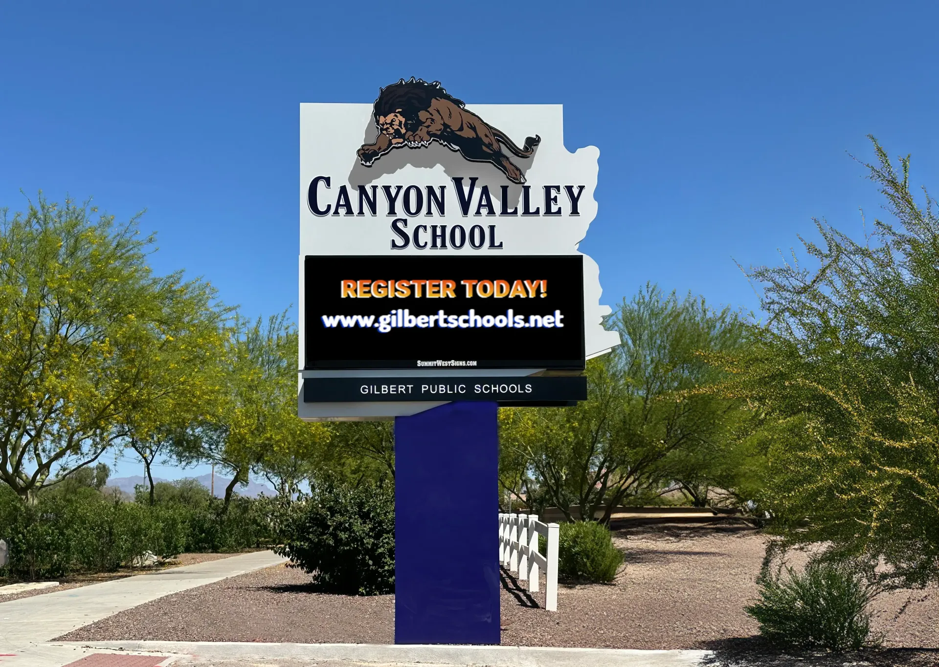 A canyon valley school sign that says register today