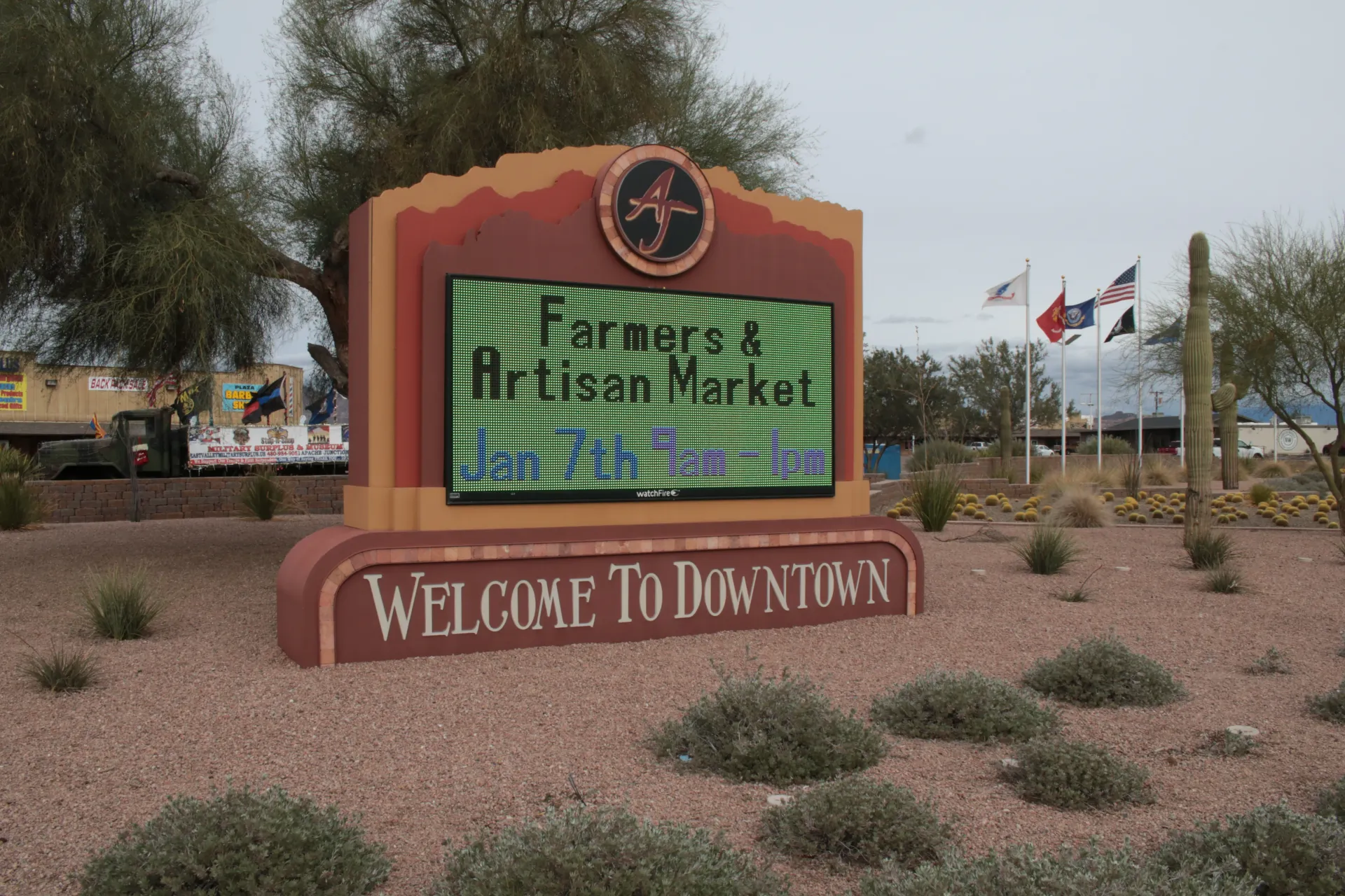 A sign that says welcome to downtown on it