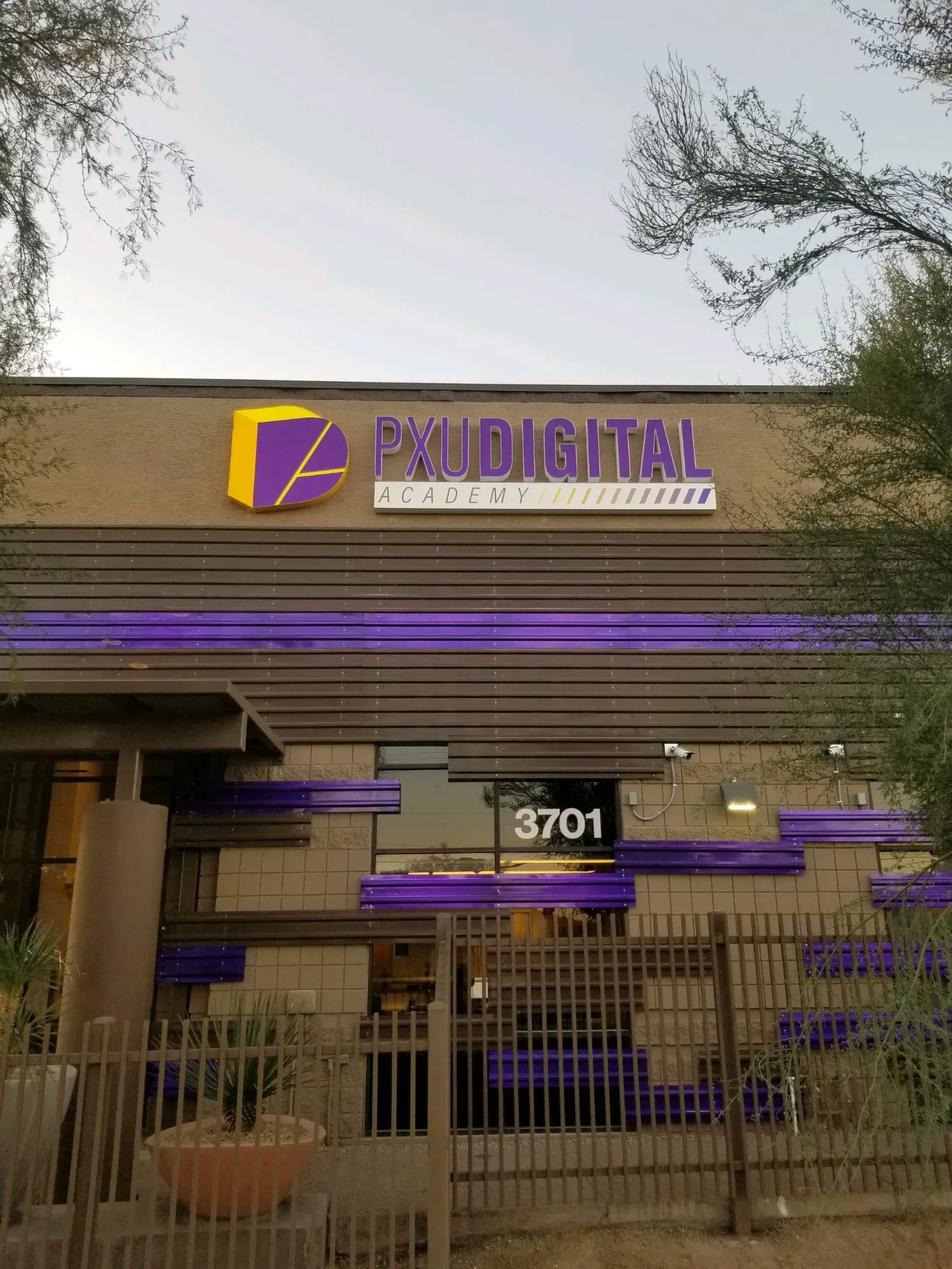 A building with a purple sign that says psycho digital