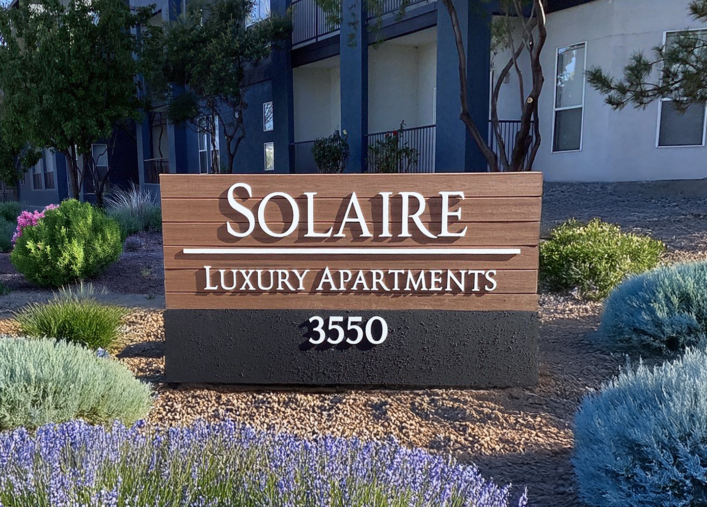 A wooden sign for solaire luxury apartments 3550