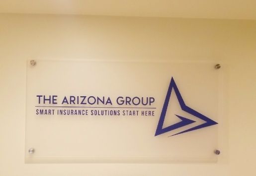 A sign that says the arizona group smart insurance solutions start here