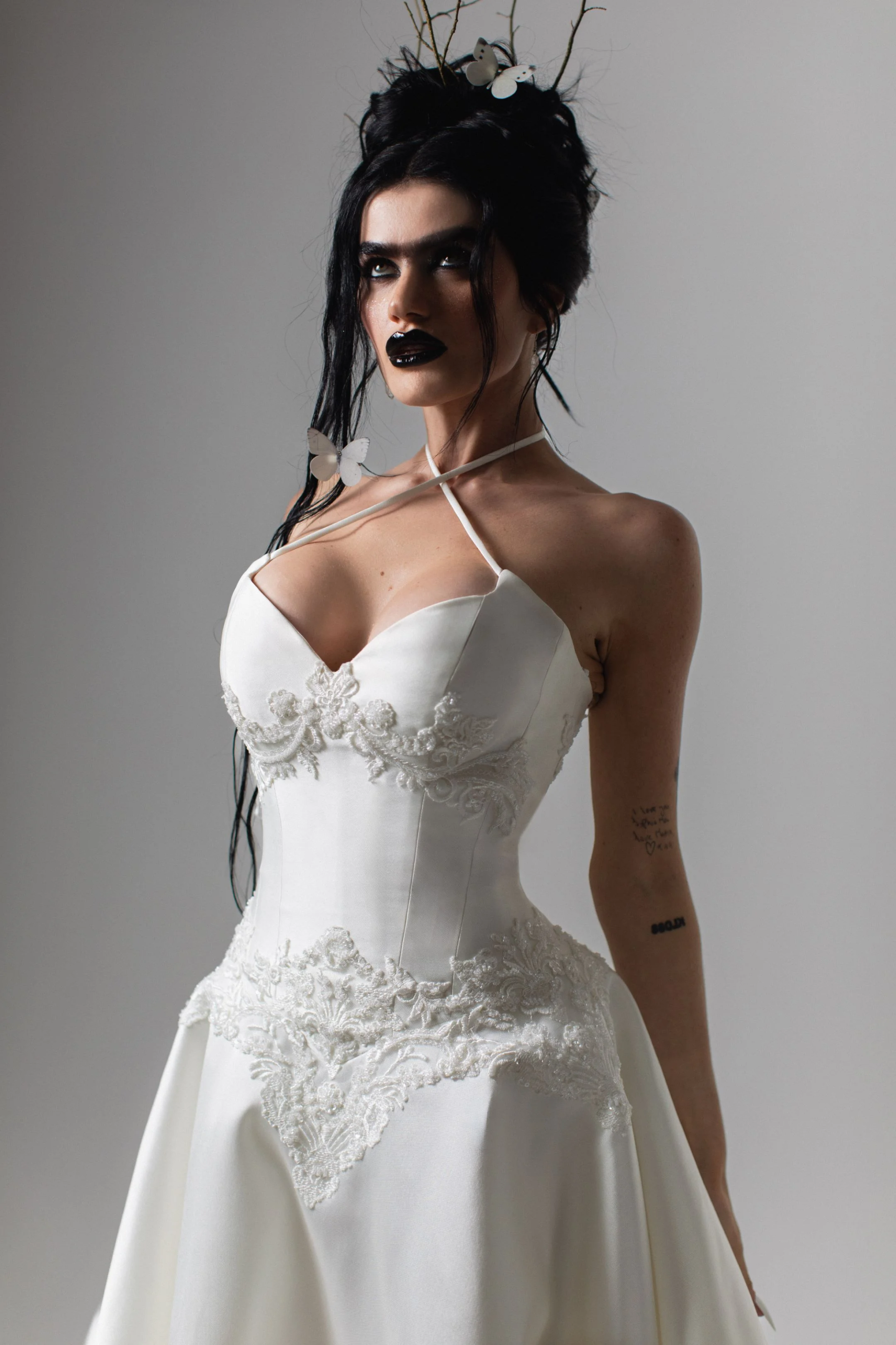 A unique bride with a sophisticated non-traditional wedding dress