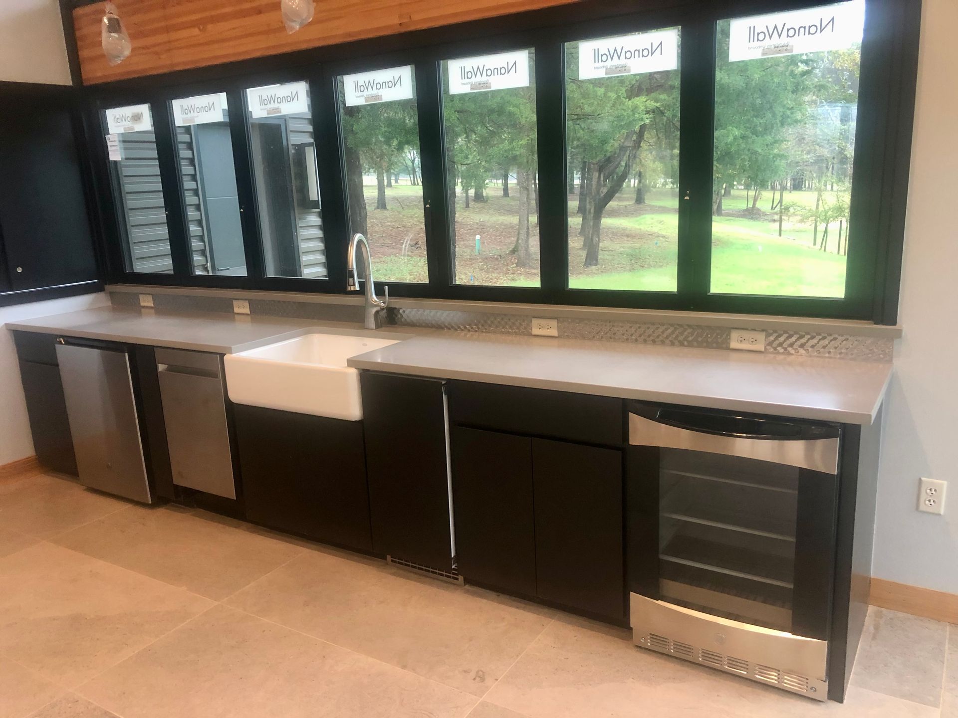 Kitchen with Grass Decoration on the Wall — Benton, LA — Sheppard’s Countertops