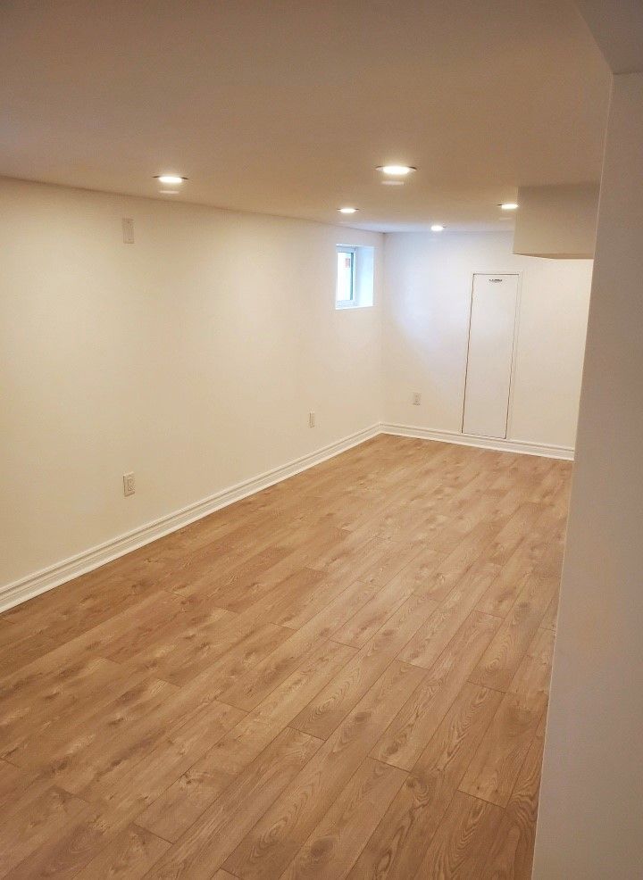 Basement with Hardwood Floors — Oldcastle, ON — Water Loc Inc