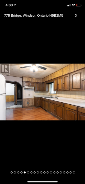 Kitchen with Wooden Cabinets — Oldcastle, ON — Water Loc Inc