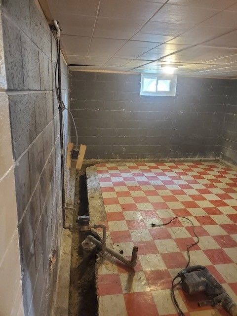Room with Checkered Floor — Oldcastle, ON — Water Loc Inc