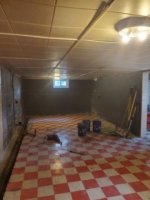Basement with a Checkered Floor — Oldcastle, ON — Water Loc Inc