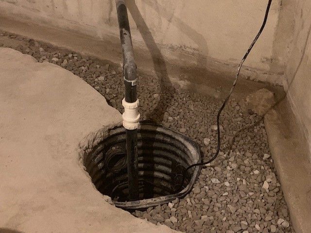 Sump Pump in a Basement — Oldcastle, ON — Water Loc Inc