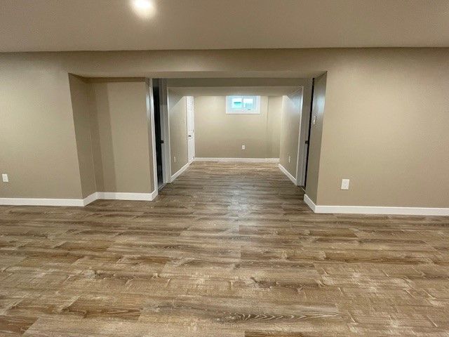 Empty Basement with Beige Walls — Oldcastle, ON — Water Loc Inc