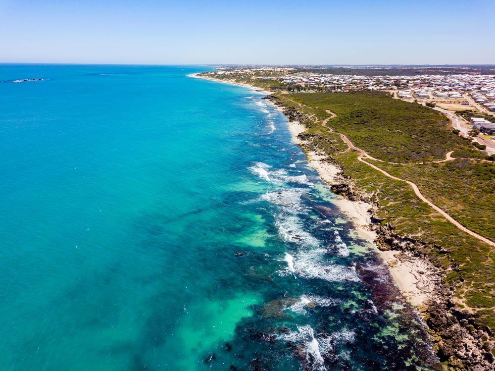 An Aerial View of A Beach with Turquoise Water — Stihl Shop Grafton in Iluka, NSW