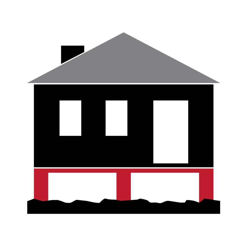 Black house on red support pillars, gray roof, white window and door.