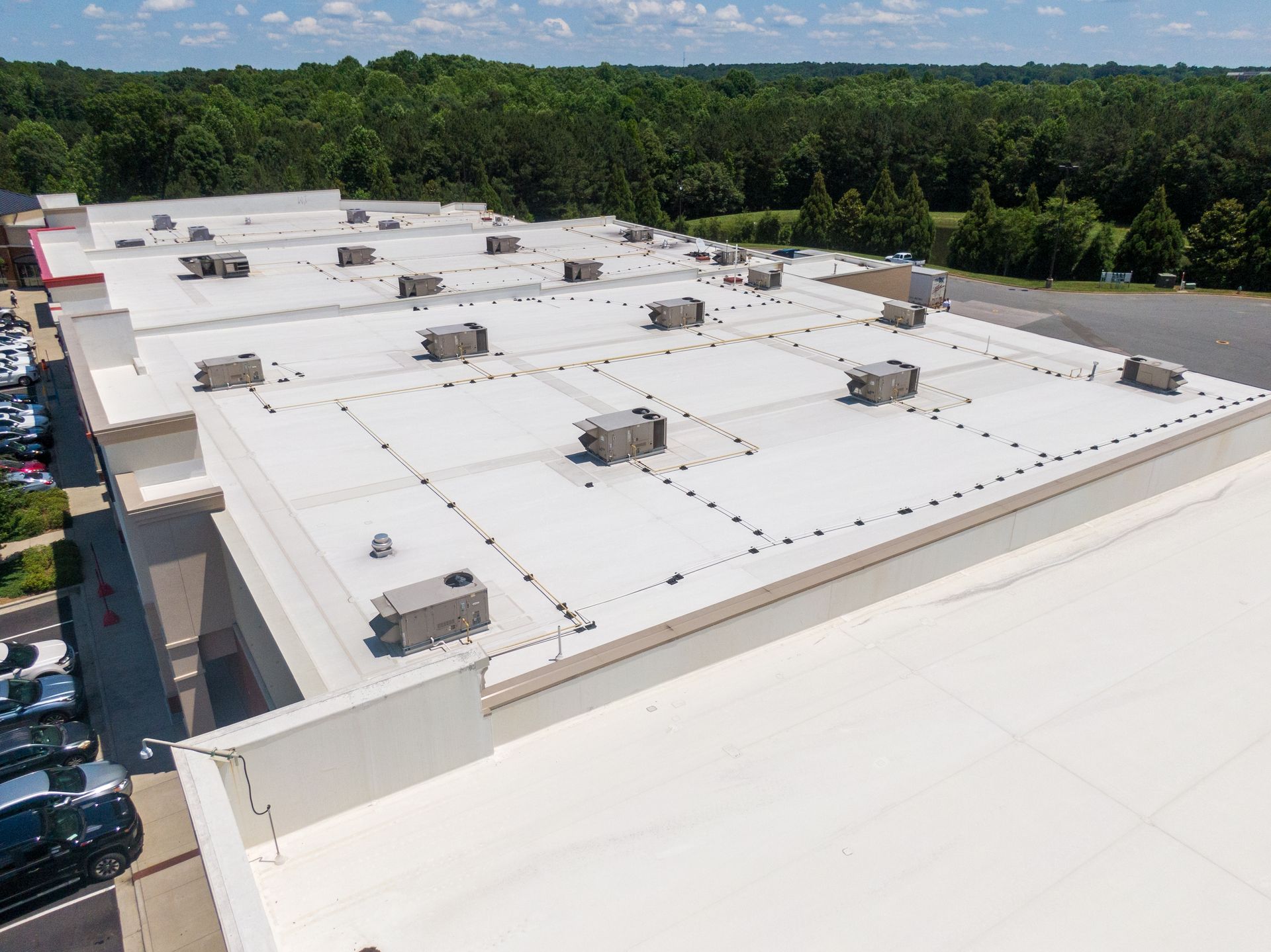 Aerial view of a commercial roof installation in Colorado Springs, CO