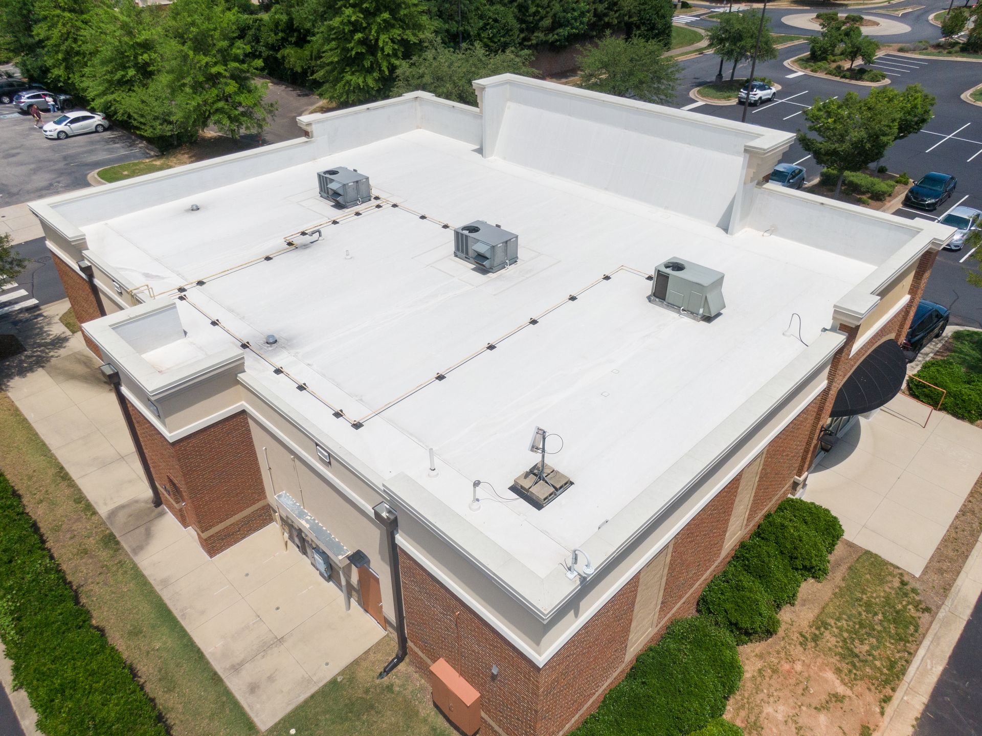 Aerial view of a commercial roof installation in Colorado Springs, CO by CCG Roofing