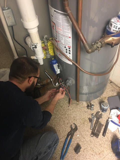 Man Plumber — Decatur, IL — Noah's Plumbing Heating & Cooling