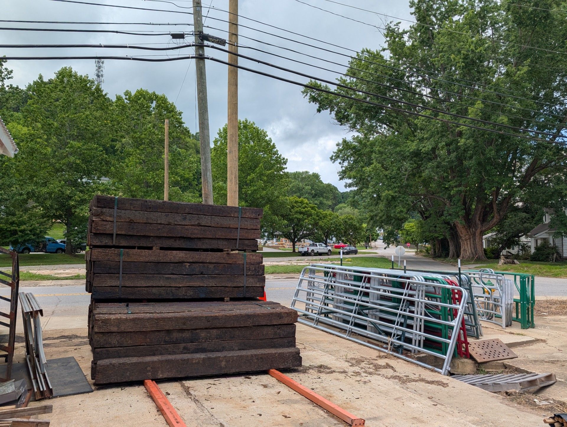 A wooden building with a sign that says greenhouse.