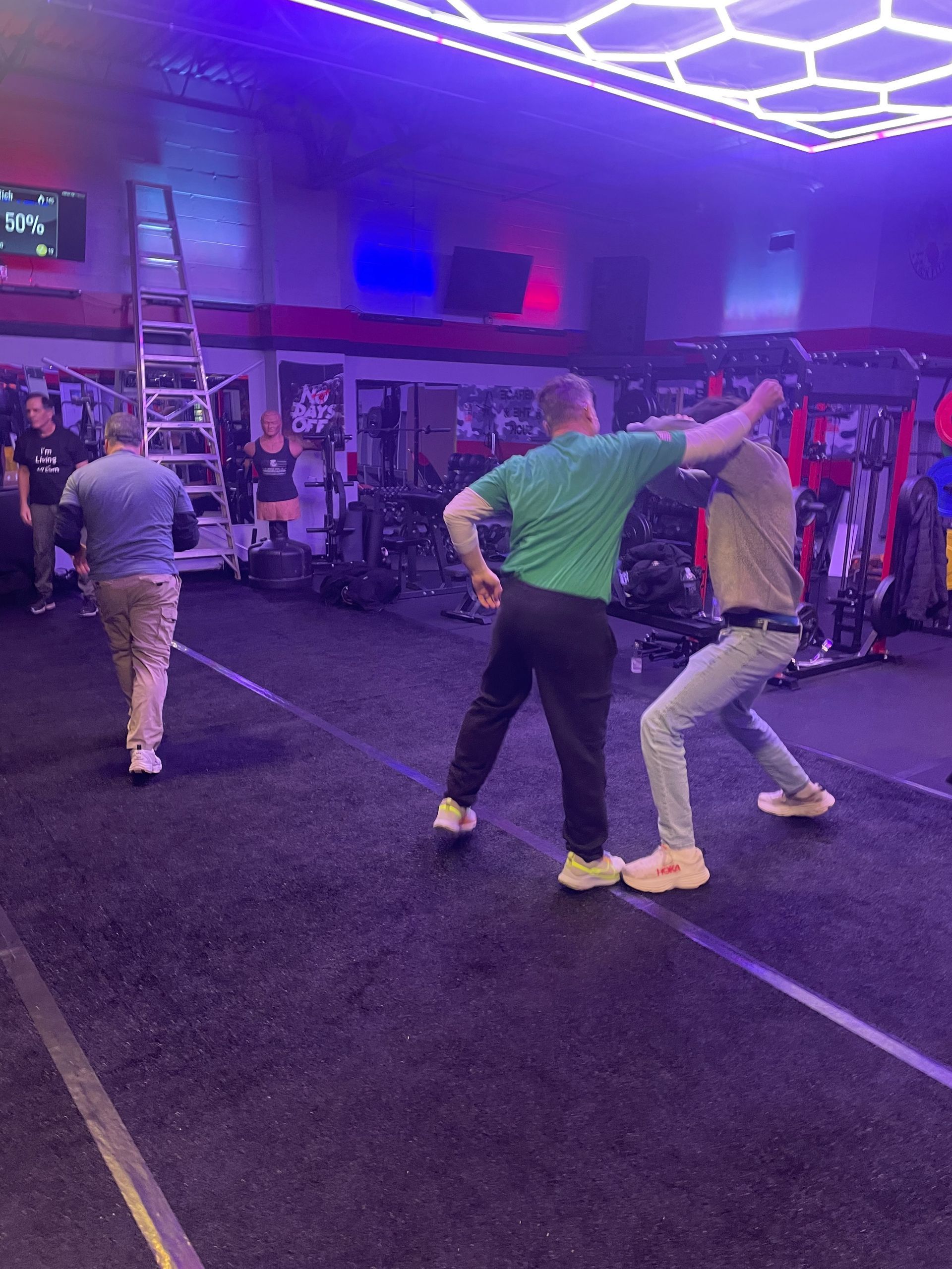 Adults practicing practical self-defense drills at Storm Krav Maga in Bohemia, NY to build confidence