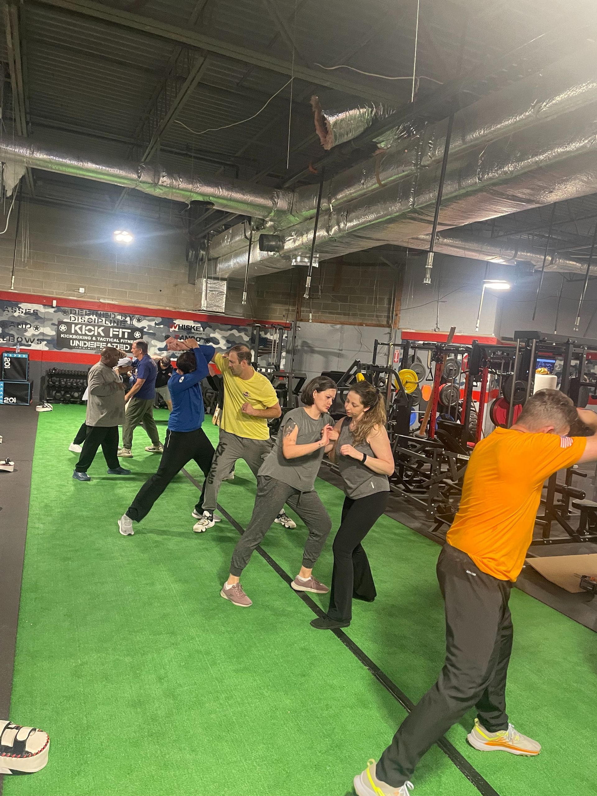 Adults practicing practical self-defense drills at Storm Krav Maga in Bohemia, NY to build real confidence.