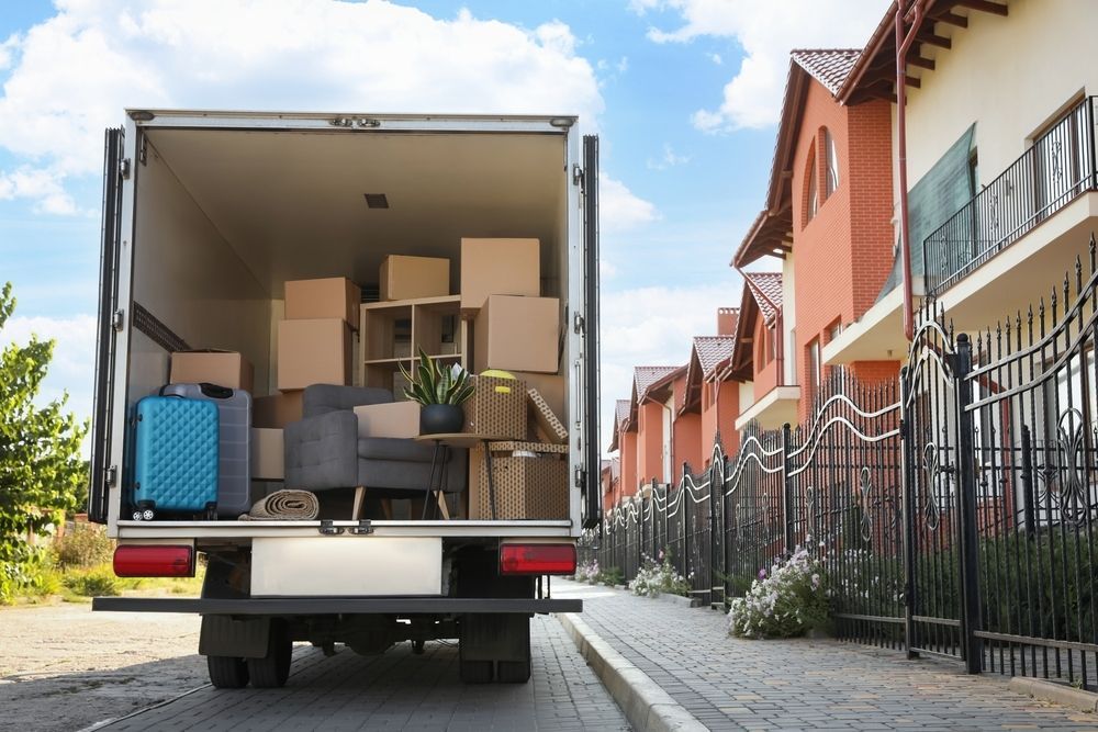 A Moving Truck Filled With Boxes and Luggage — A-Team Delivery Services Pty Ltd in Maitland, NSW