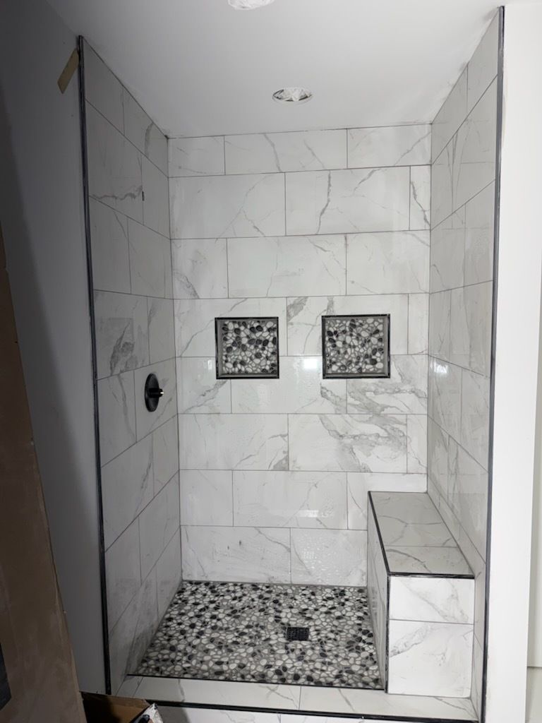 A house with a screened in porch and stairs